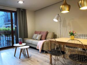 A seating area at Villa de Plan Apartments&Suites