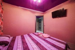 Cama o camas de una habitación en Nikolaevskie Apartments