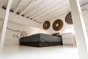 A bed or beds in a room at Almudena Modern & luxury space near Plaza Mayor