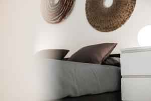 A bed or beds in a room at Almudena Modern & luxury space near Plaza Mayor