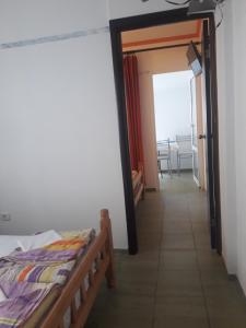 Postel nebo postele na pokoji v ubytování Apartmani Bugarski