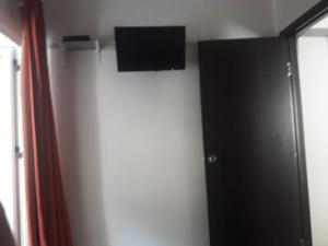 TV a/nebo společenská místnost v ubytování Apartmani Bugarski