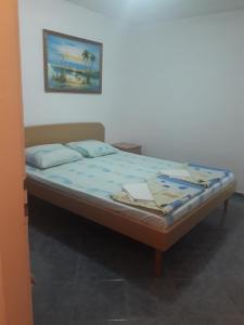 Postel nebo postele na pokoji v ubytování Apartmani Bugarski