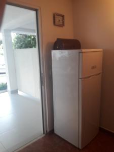 Kuchyň nebo kuchyňský kout v ubytování Apartmani Bugarski