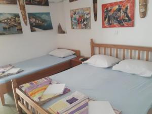 Postel nebo postele na pokoji v ubytování Apartmani Bugarski