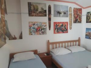 Postel nebo postele na pokoji v ubytování Apartmani Bugarski
