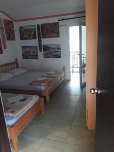 Postel nebo postele na pokoji v ubytování Apartmani Bugarski