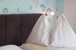 Letto o letti in una camera di Hotel Frohe Aussicht