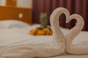 Voodi või voodid majutusasutuse Premium Hotel Panoráma toas
