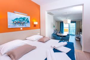 Postel nebo postele na pokoji v ubytování Apartments Villa Loznica