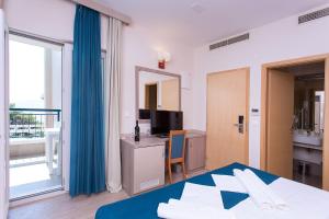 Postel nebo postele na pokoji v ubytování Apartments Villa Loznica