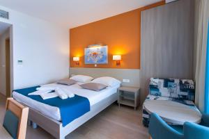 Postel nebo postele na pokoji v ubytování Apartments Villa Loznica