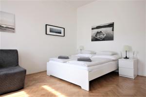 Postel nebo postele na pokoji v ubytování Angel City Aparthotel