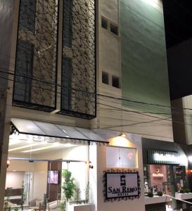 a building with a sign that reads san francisco at Hotel San Remo in Jequié