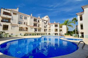 Bazén v ubytování Renteando Albir Apartments nebo v jeho okolí
