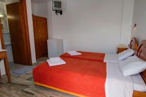 Postel nebo postele na pokoji v ubytování Hotel Lofos - The Hill