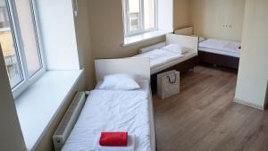 Postel nebo postele na pokoji v ubytování Bella Riga Hotel with Self-Check in