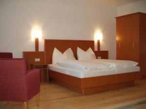 Letto o letti in una camera di Gasthof Oberer Gesslbauer