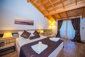 a bedroom with a large bed in a room at S3 Seahorse Beach Club in Oludeniz