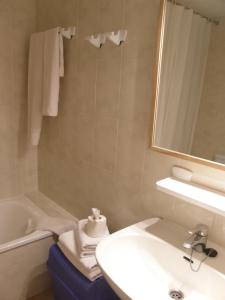 Ванная комната в Apartamentos Miami
