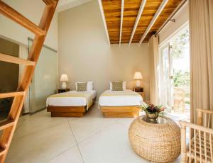 Ένα ή περισσότερα κρεβάτια σε δωμάτιο στο Rukgala Retreat