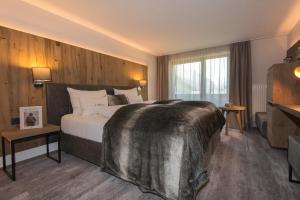 Postel nebo postele na pokoji v ubytování Hotel Sonnblick