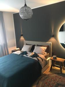 Postel nebo postele na pokoji v ubytování Cityapartment Graz