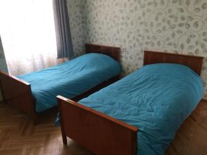 Ένα ή περισσότερα κρεβάτια σε δωμάτιο στο Apartment EKAKO