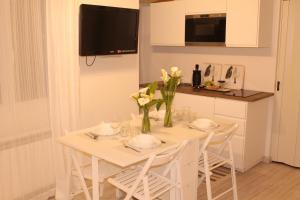 Telewizja i/lub zestaw kina domowego w obiekcie Bonito Apartamento Mundaka EBI-82