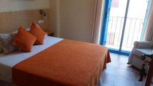 Een bed of bedden in een kamer bij La Trancada