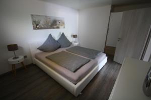 Postel nebo postele na pokoji v ubytování Milonia