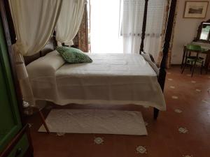 Postel nebo postele na pokoji v ubytování La terrazza di Anna