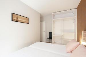 Łóżko lub łóżka w pokoju w obiekcie Cielo Granada