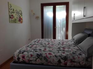 Postel nebo postele na pokoji v ubytování Silos Torrenova