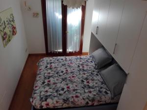 Postel nebo postele na pokoji v ubytování Silos Torrenova