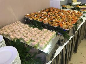 a buffet line with many different types of food at Bikini Hotel in Vieste