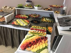 a buffet with many different types of food on display at Bikini Hotel in Vieste