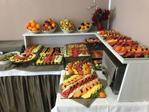 a buffet with many different types of fruit on display at Bikini Hotel in Vieste