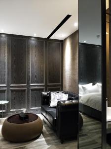 Postel nebo postele na pokoji v ubytování 小小邸 Small Hotel