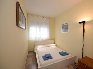 Postel nebo postele na pokoji v ubytování Apartment Vila Olímpica- Sant Martí - Sardenya by Interhome