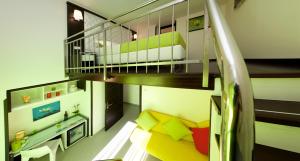 a small room with a staircase and a living room at Sorrento Flats in Sorrento