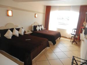 Fotografie z fotogalerie ubytování Hotel 9 Manantiales v destinaci Chignahuapan + 42 fotografií