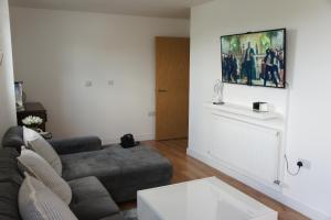 TV a/nebo společenská místnost v ubytování Hamptons Point