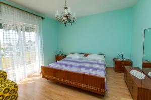 Postel nebo postele na pokoji v ubytování Apartment Lele