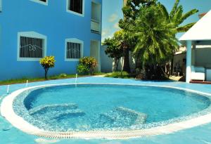 Bazén v ubytování Hotel Maracas Punta Cana nebo v jeho okolí