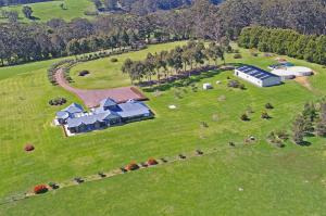 an aerial view of a house on a green field at Sensational Heights Bed & Breakfast in Denmark