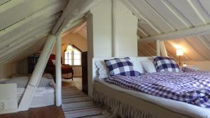 Postel nebo postele na pokoji v ubytování Cottage - Majviken