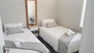 Postel nebo postele na pokoji v ubytování 604 St Tropez