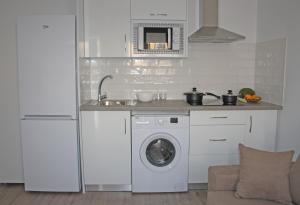 Kuchyňa alebo kuchynka v ubytovaní Apartamentos Angelita Plaza Beach
