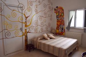 Posteľ alebo postele v izbe v ubytovaní B&B La casa degli artisti + 37 fotografií